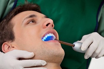 man receiving dental bonding