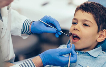 Child receiving emergency dental care
