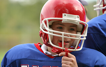 Football player in red helmet